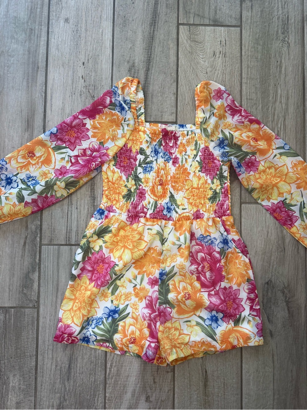 btween Floral Smocked Long-Sleeve Romper in Yellow, Pink & Blue